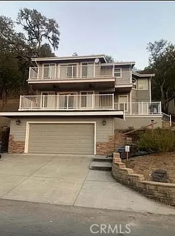 a front view of a house with a garage