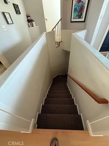 a view of balcony with furniture