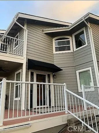 a front view of a house with a porch