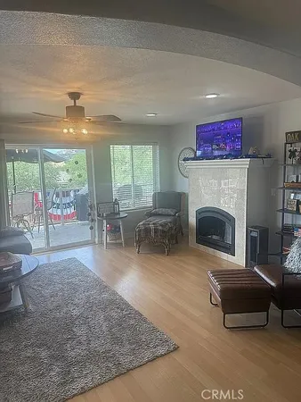a view of hallway with furniture and a window
