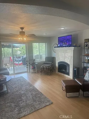 a view of hallway with furniture and a window
