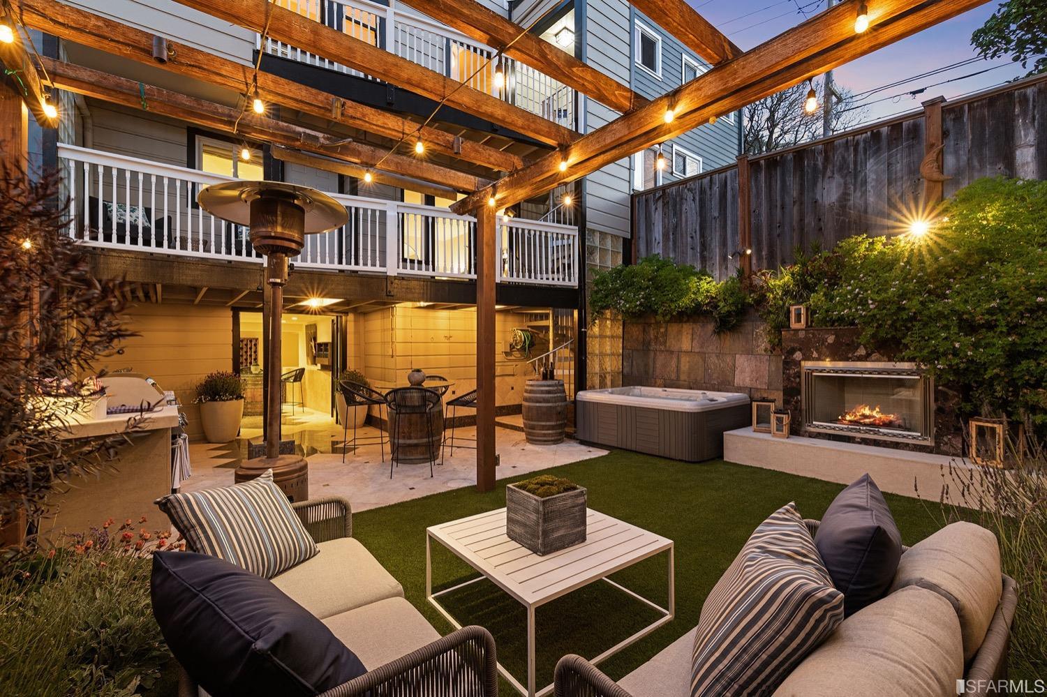 a view of a patio with couches and potted plants