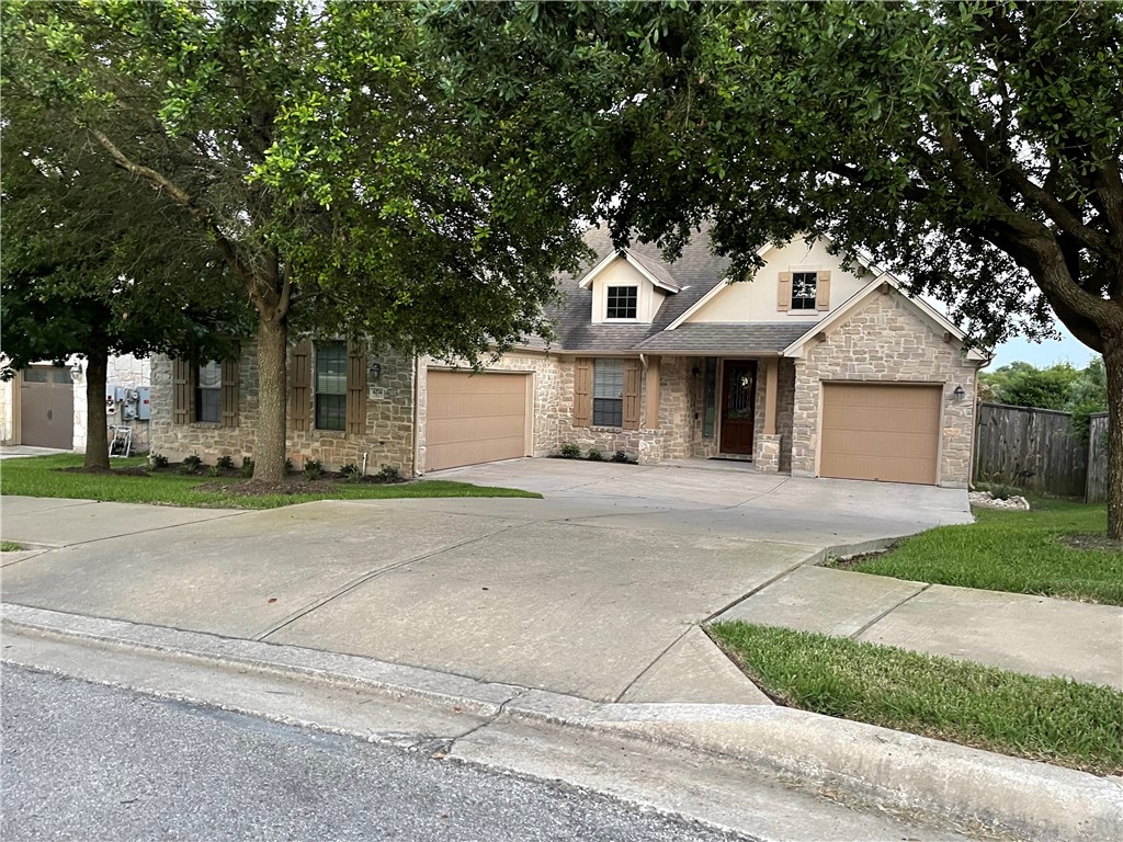 4274 Ridgebend Drive Round Rock, TX 78665 - Photo 1 of 1 front view of a house next to a yard