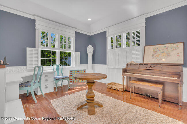 2107 3rd Avenue Spring Lake, NJ 07762 - Photo 17 of 40 a living room with furniture a table and large windows