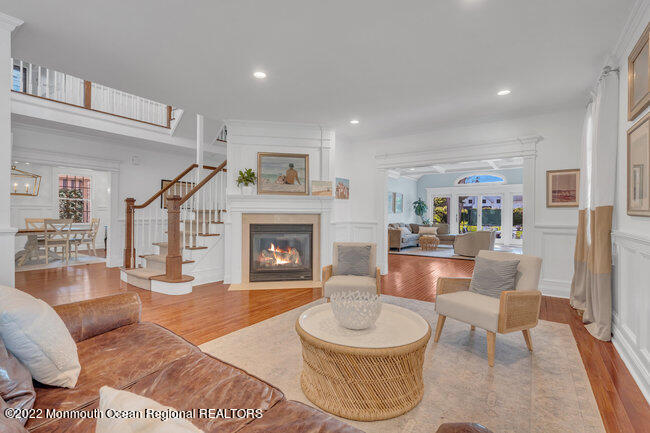 2107 3rd Avenue Spring Lake, NJ 07762 - Photo 19 of 40 a living room with furniture and a fireplace