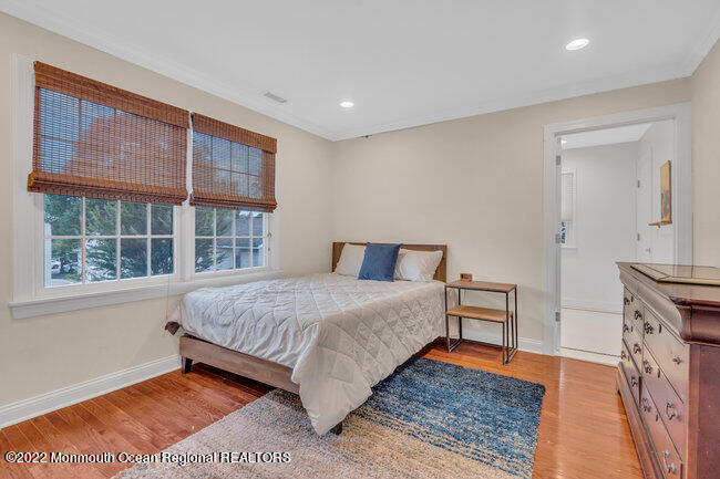 2107 3rd Avenue Spring Lake, NJ 07762 - Photo 21 of 40 a bedroom with a bed and a large window