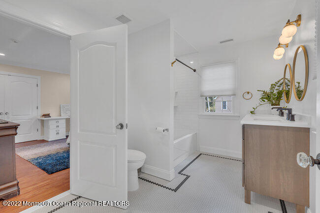 2107 3rd Avenue Spring Lake, NJ 07762 - Photo 25 of 40 a bathroom with a sink toilet and shower