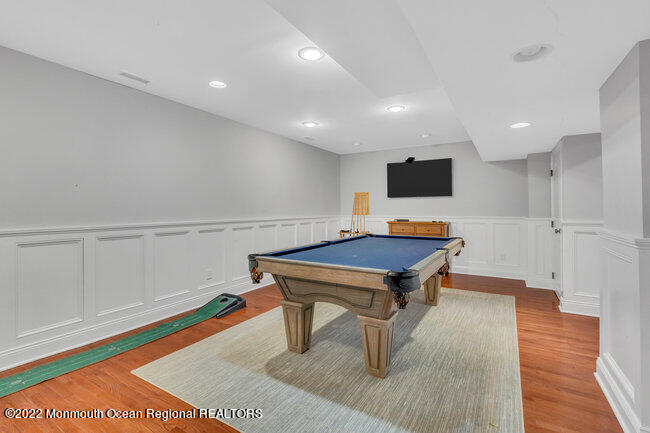 2107 3rd Avenue Spring Lake, NJ 07762 - Photo 35 of 40 a living room with a table and chairs