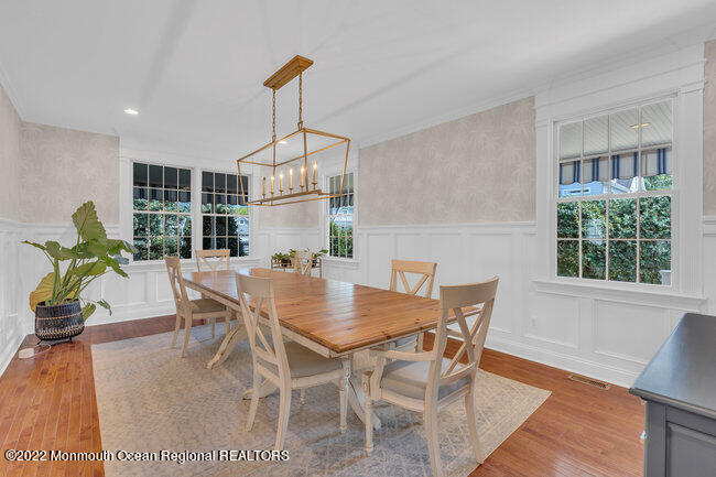 2107 3rd Avenue Spring Lake, NJ 07762 - Photo 9 of 40 a view of a dining room with furniture window and wooden floor