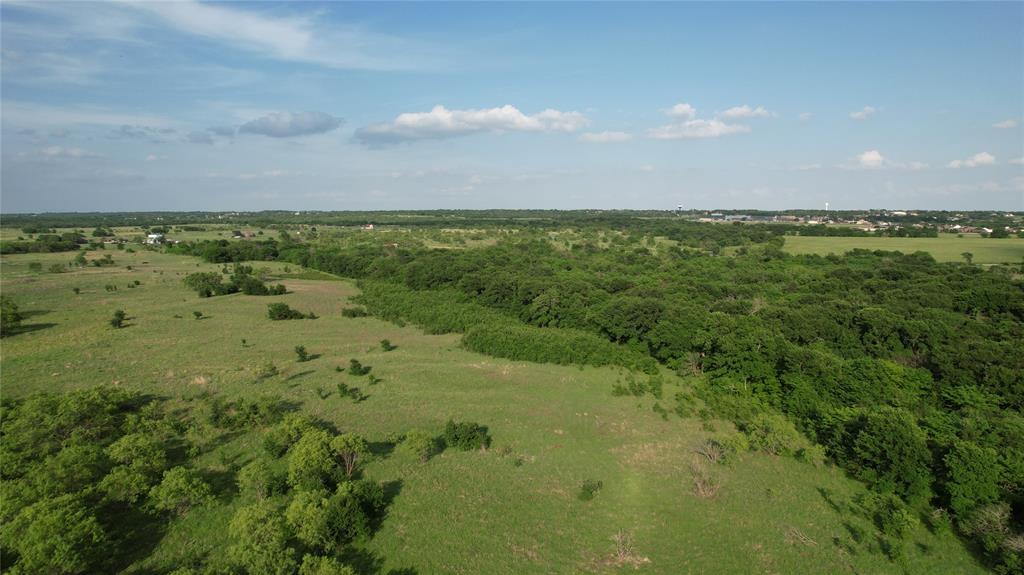 11 Old Tioga Road, Unit 22 ACRES Gunter, TX 75058 - Photo 4 of 6 a view of a field with an ocean