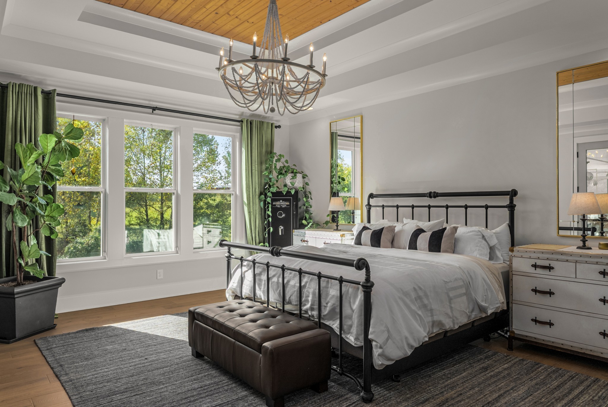 1780 Berea Church Road Lebanon, TN 37087 - Photo 20 of 42 a bedroom with a bed and a chandelier