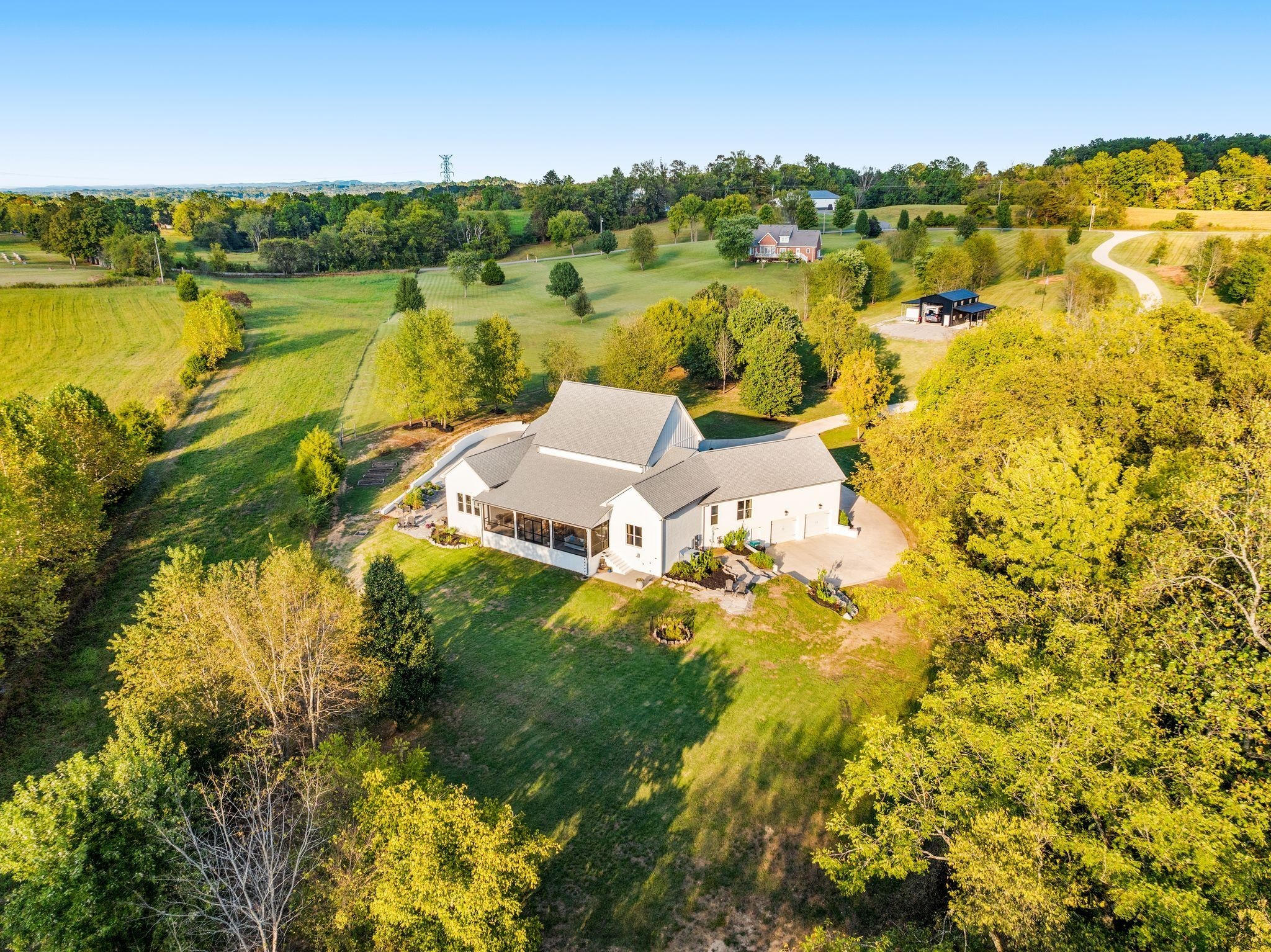 1780 Berea Church Road Lebanon, TN 37087 - Photo 8 of 42 a view of a lake with a house