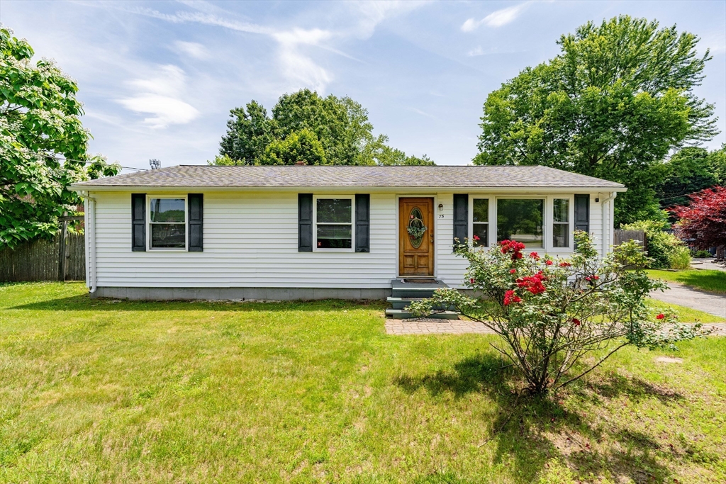75 Puritan Road Springfield, MA 01119 - Photo 1 of 33 a view of a house with swimming pool and garden