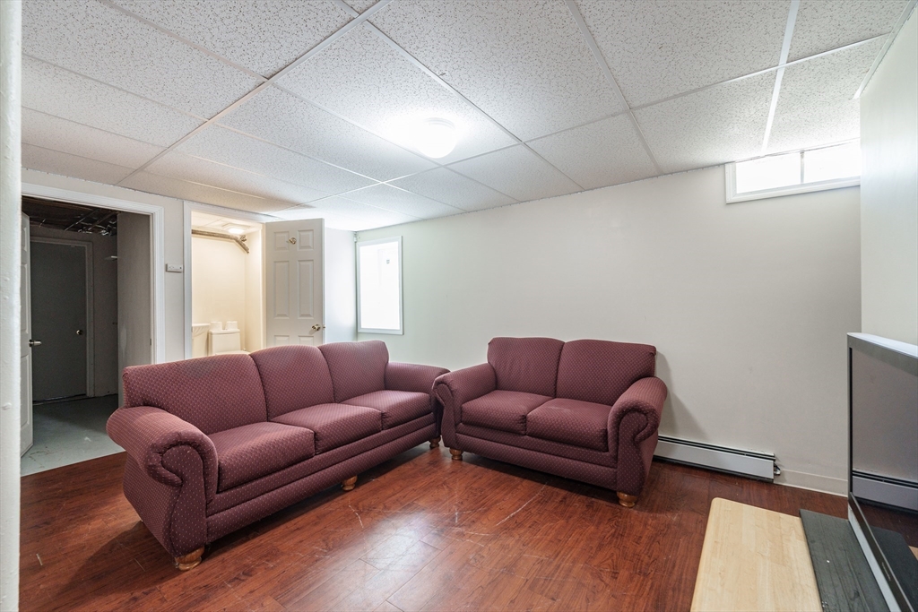 75 Puritan Road Springfield, MA 01119 - Photo 21 of 33 a living room with furniture and a couch
