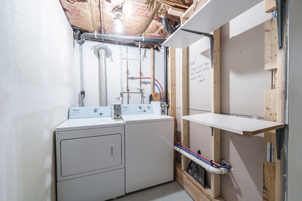 75 Puritan Road Springfield, MA 01119 - Photo 25 of 33 a utility room with a washer and dryer