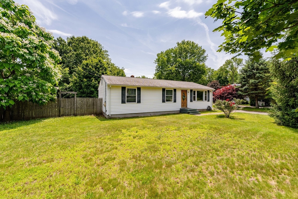 75 Puritan Road Springfield, MA 01119 - Photo 26 of 33 a house with swimming pool in front of it
