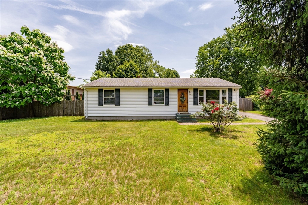 75 Puritan Road Springfield, MA 01119 - Photo 27 of 33 a front view of a house with yard and swimming pool