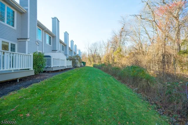 a view of a yard in front of house