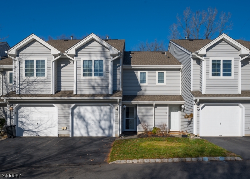 6 Davenport Road Montville, NJ 07045 - Photo 25 of 28 a front view of a house with a yard