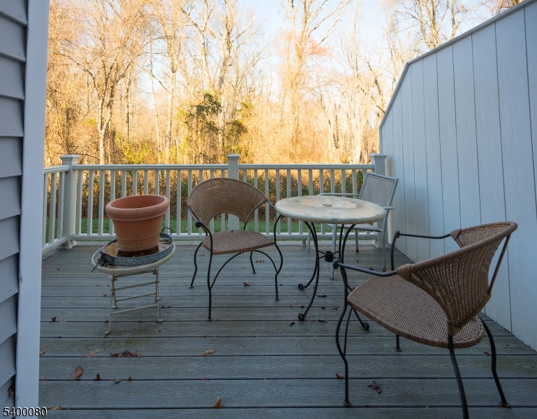 6 Davenport Road Montville, NJ 07045 - Photo 6 of 28 a view of a chairs and table on the deck