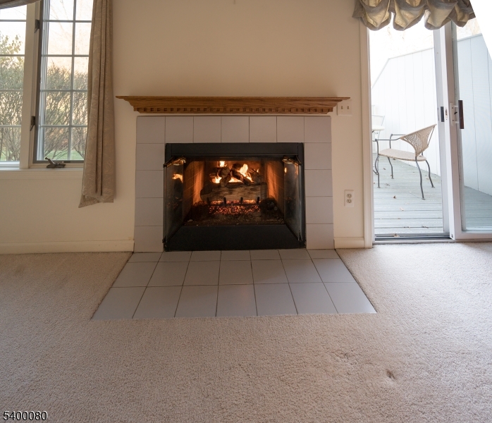 6 Davenport Road Montville, NJ 07045 - Photo 7 of 28 a view of empty room with fireplace and window