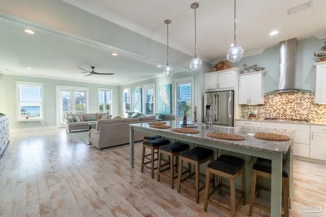 a kitchen with a table and chairs in it