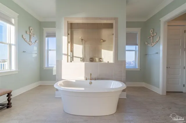 a bathroom with a bathtub and a sink