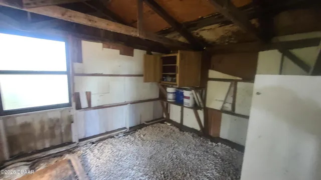 a view of storage and utility room