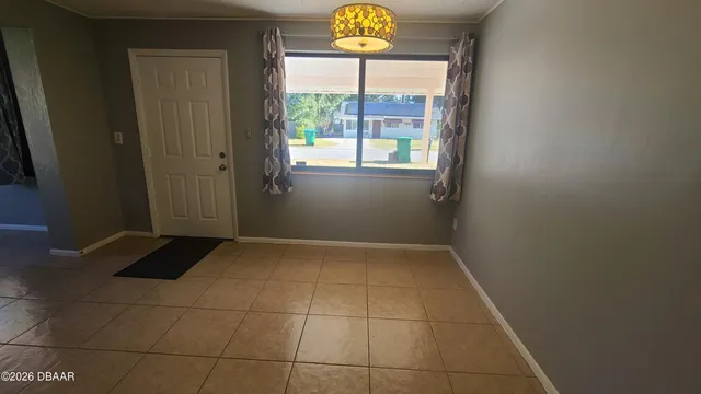 a kitchen with stainless steel appliances a stove sink and cabinets
