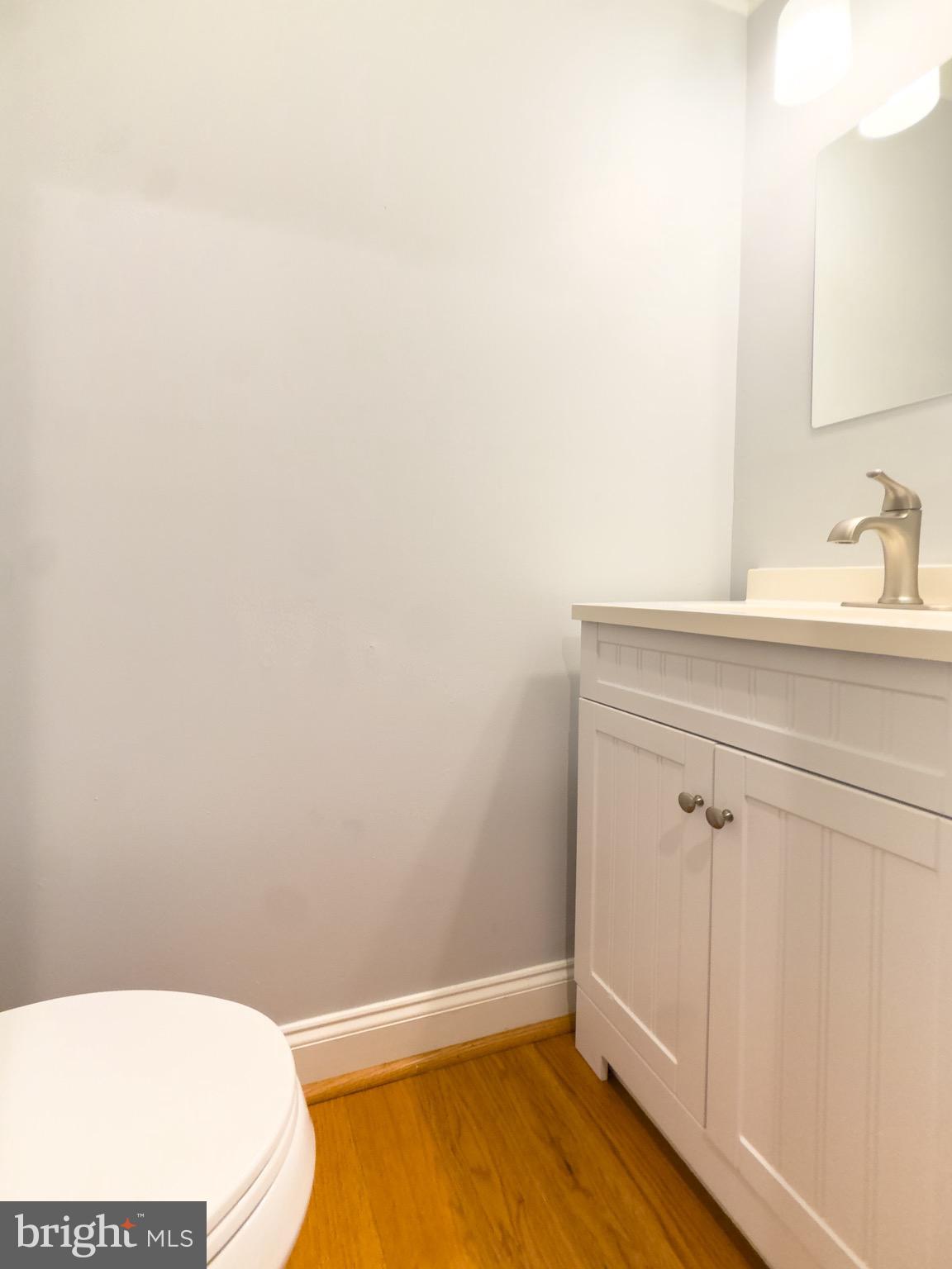 2419 Ansdel Court Reston, VA 20191 - Photo 21 of 41 a bathroom with a sink and vanity