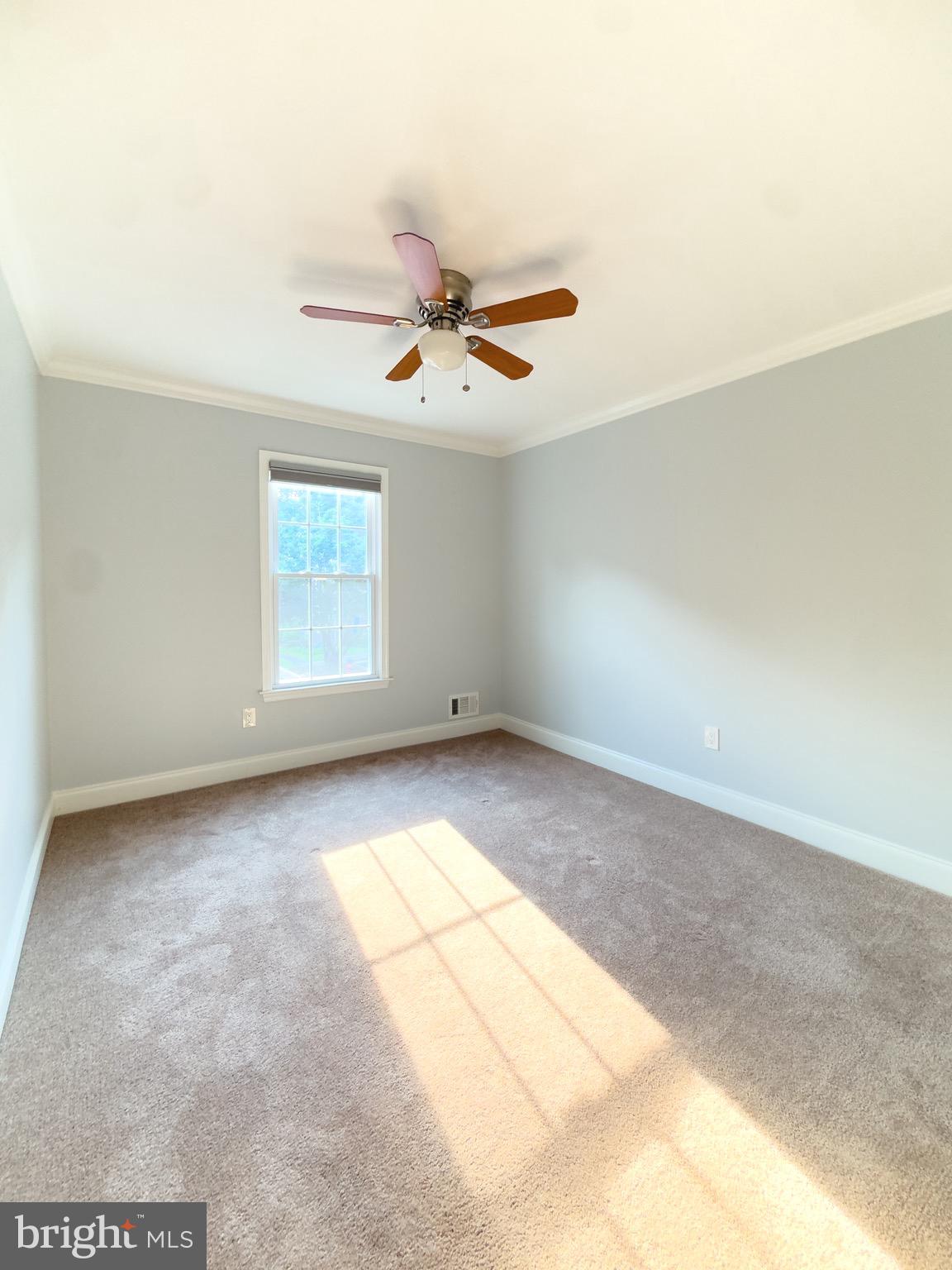2419 Ansdel Court Reston, VA 20191 - Photo 23 of 41 an empty room with windows and fan