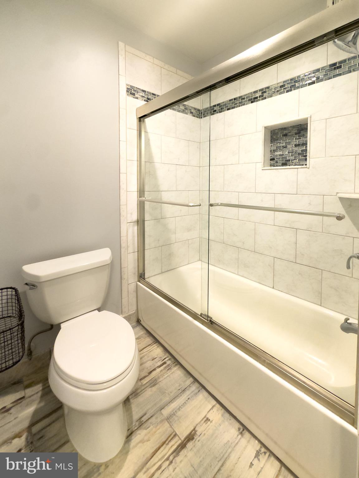 2419 Ansdel Court Reston, VA 20191 - Photo 28 of 41 a bathroom with a toilet and a shower