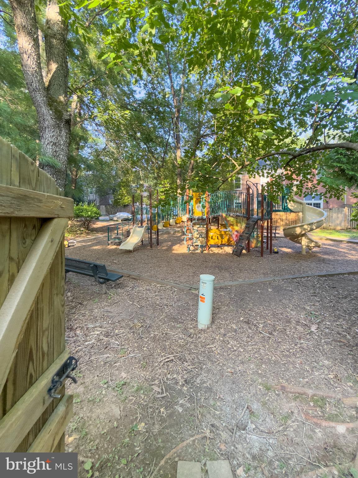 2419 Ansdel Court Reston, VA 20191 - Photo 40 of 41 a backyard of a house with barbeque oven and outdoor seating