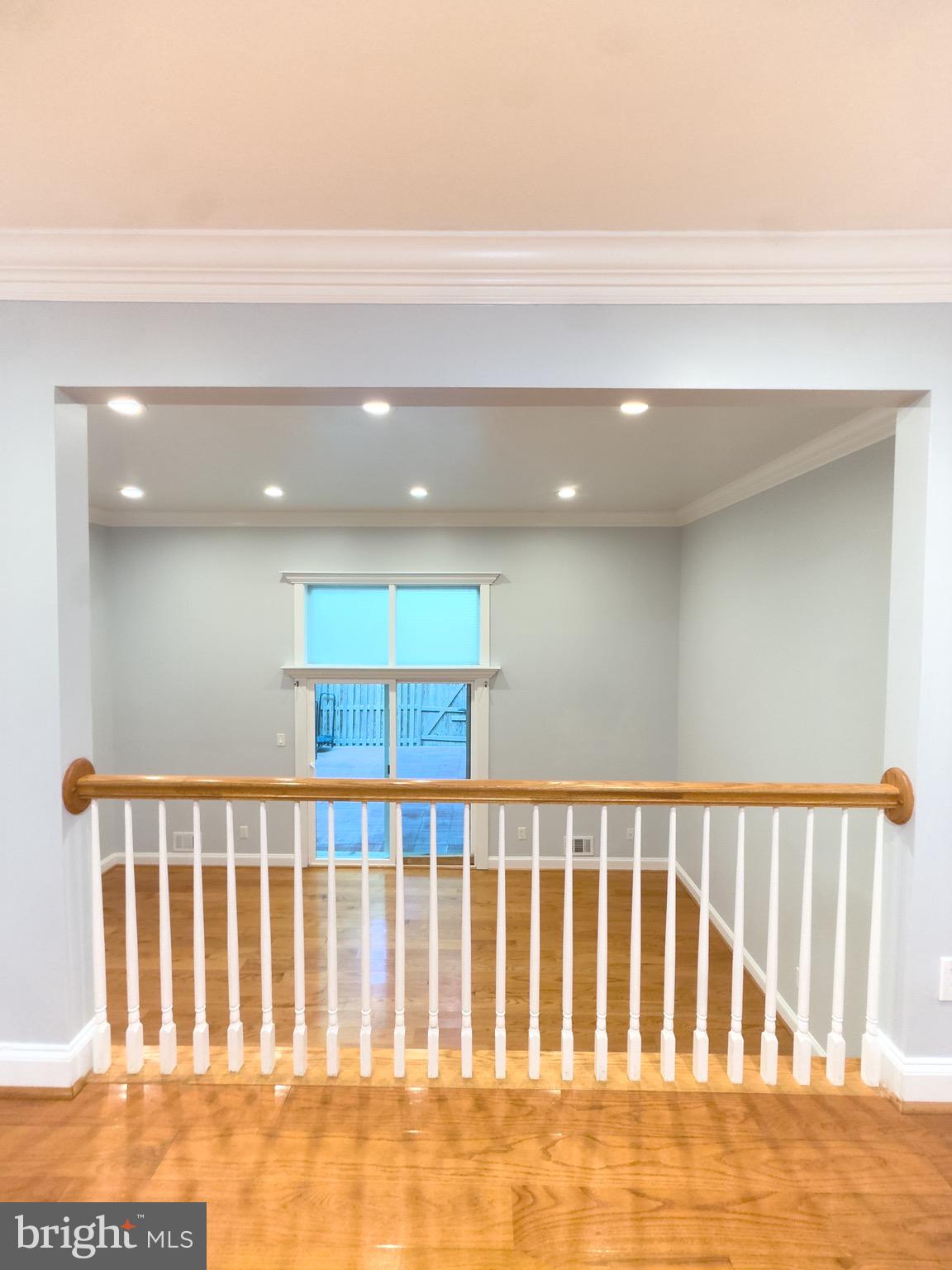 2419 Ansdel Court Reston, VA 20191 - Photo 9 of 41 a view of staircase with white walls