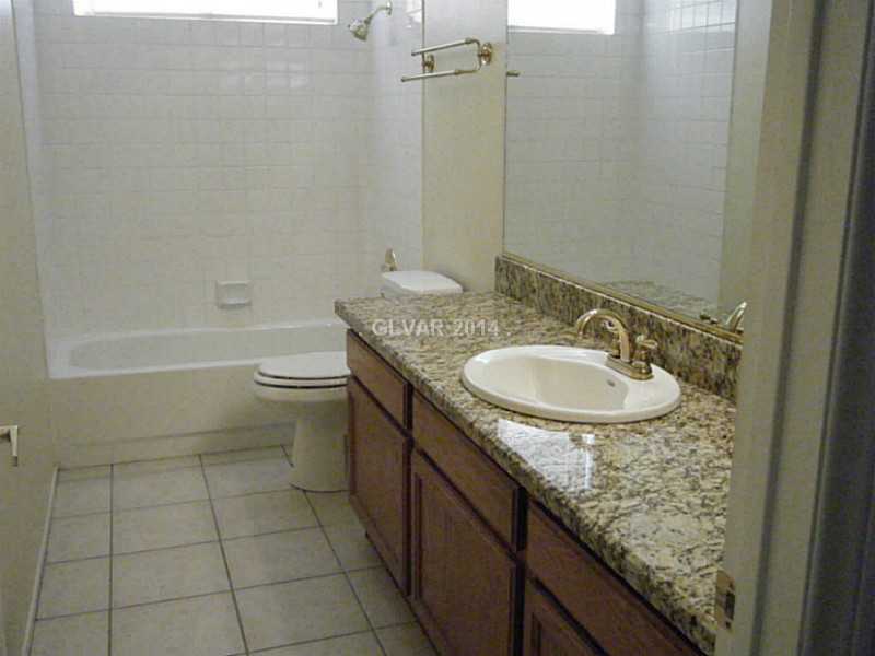 192 Reed Lane Henderson, NV 89074 - Photo 15 of 34 Guest Bathroom. Full bath downstairs has granite counter, tile floors