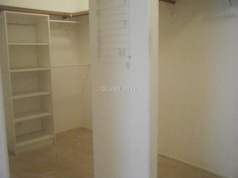 192 Reed Lane Henderson, NV 89074 - Photo 23 of 34 Other. Large walk - in lighted closet complete with built in shelving provides plenty of space for his and hers