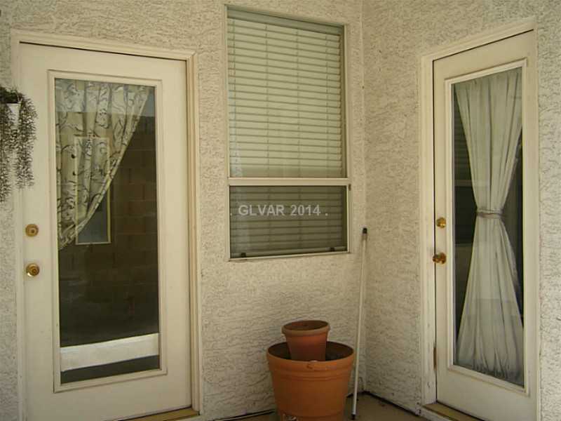 192 Reed Lane Henderson, NV 89074 - Photo 30 of 34 Patio/Deck. Small covered patio off dining room and kitchen