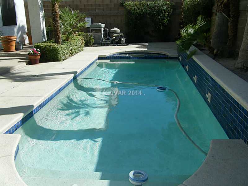 192 Reed Lane Henderson, NV 89074 - Photo 31 of 34 Swimming Pool/Hot Tub/Sauna. Pool and separate spa surrounded by cool decking in the back yard