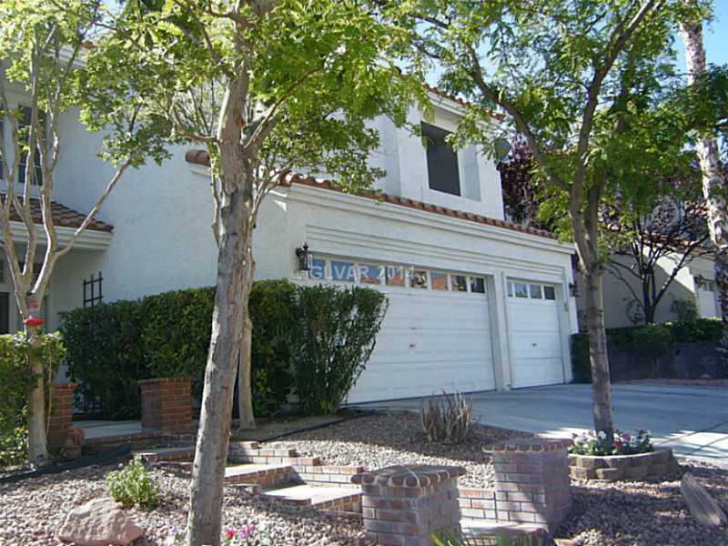 192 Reed Lane Henderson, NV 89074 - Photo 33 of 34 Facade/Exterior Front. 3 car garage has built in shelving and storage cabinets; remote keypad entry