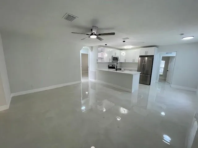 a view of a room with racks on the wall