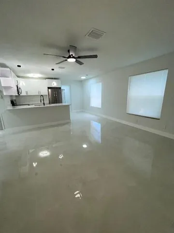 an empty room with windows