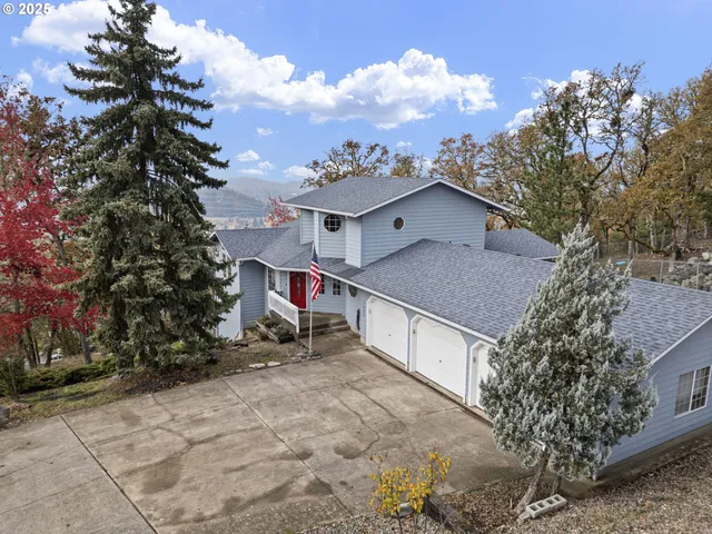 a house with trees in front of it