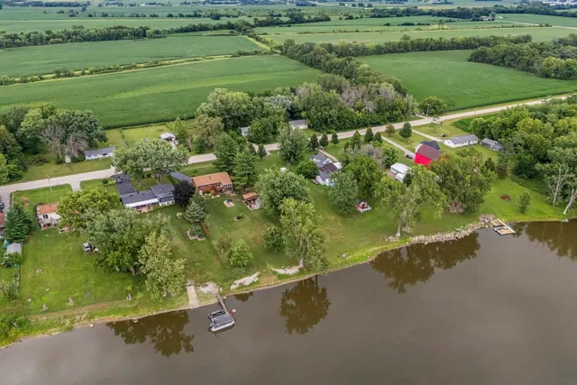 a view of a garden with a lake view
