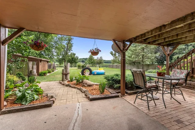 a garden view with a seating space
