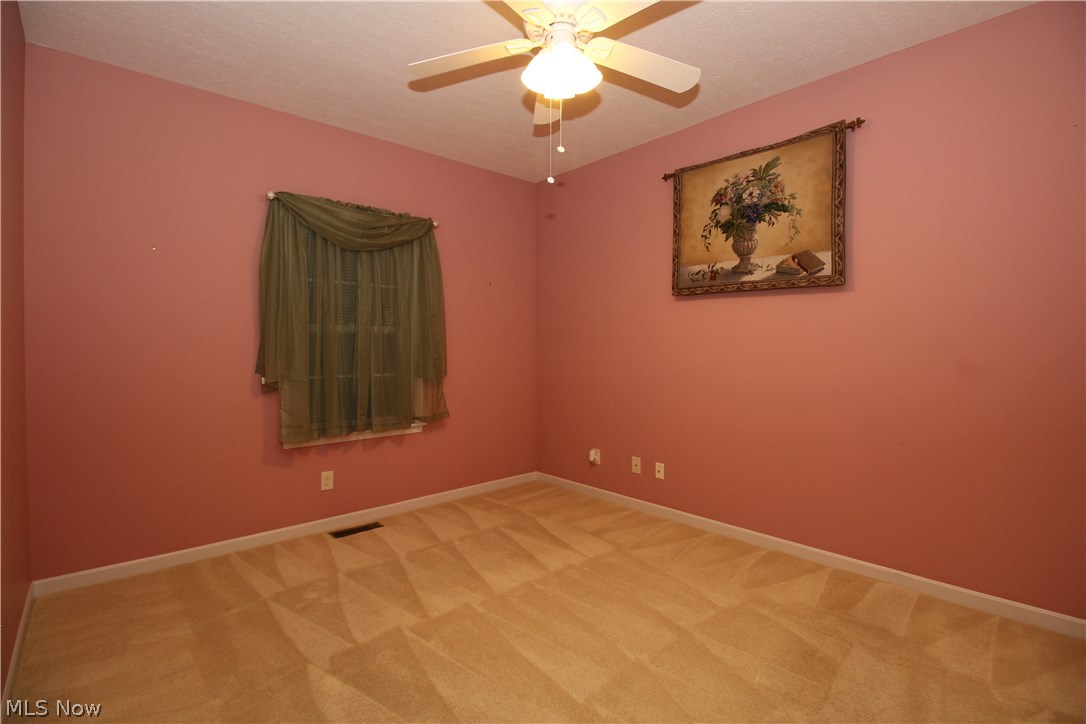 1930 Knight Road Akron, OH 44306 - Photo 8 of 25 Master Bedroom - features ceiling fan and freshly cleaned carpeting.