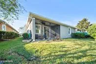 a view of a lake with a yard