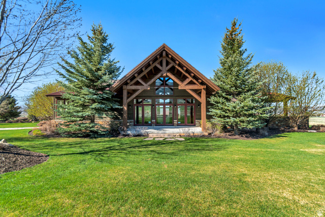 2579 Splendor Valley Road Kamas, UT 84036 - Photo 3 of 87 Rear view of house featuring a lawn