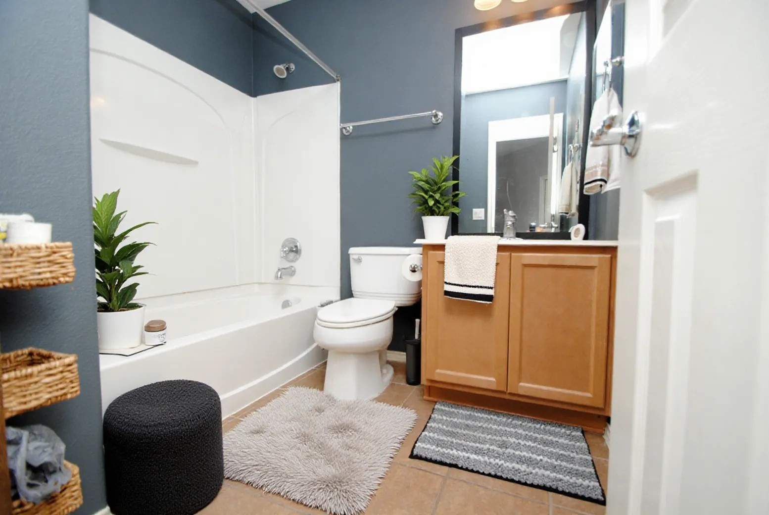 16427 Kettlebrook Lane Houston, TX 77049 - Photo 23 of 27 a living room with furniture and a potted plant