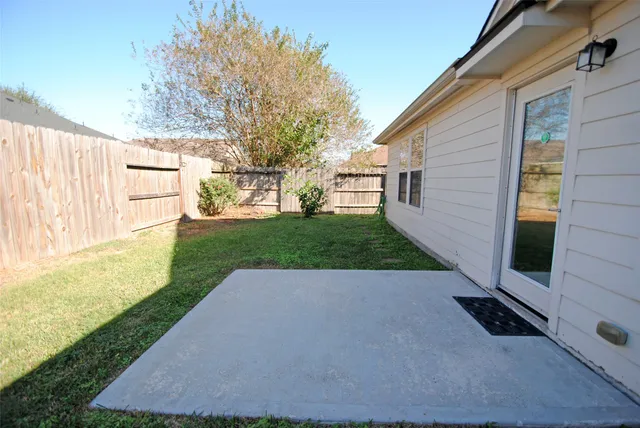 a view of a backyard with a garden