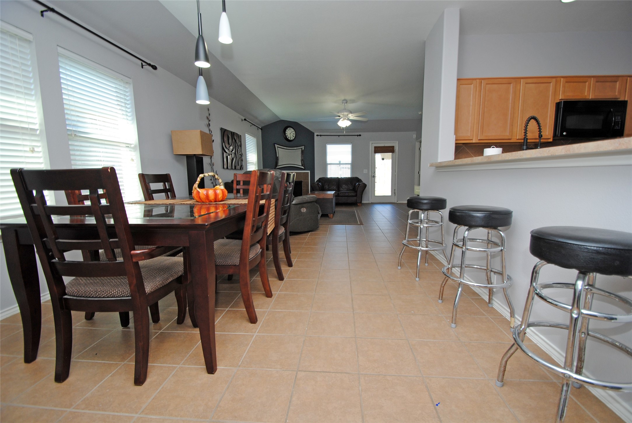 16427 Kettlebrook Lane Houston, TX 77049 - Photo 8 of 27 a view of a dining room with furniture